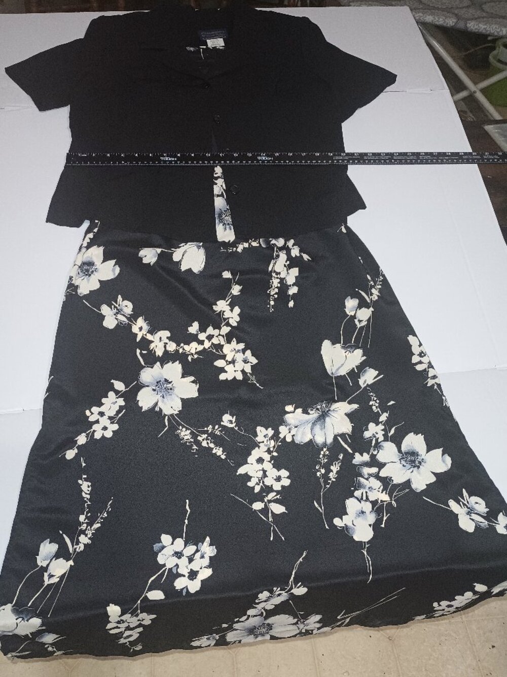Women's black dress with flowers and black 3/4 sleeved jacket
